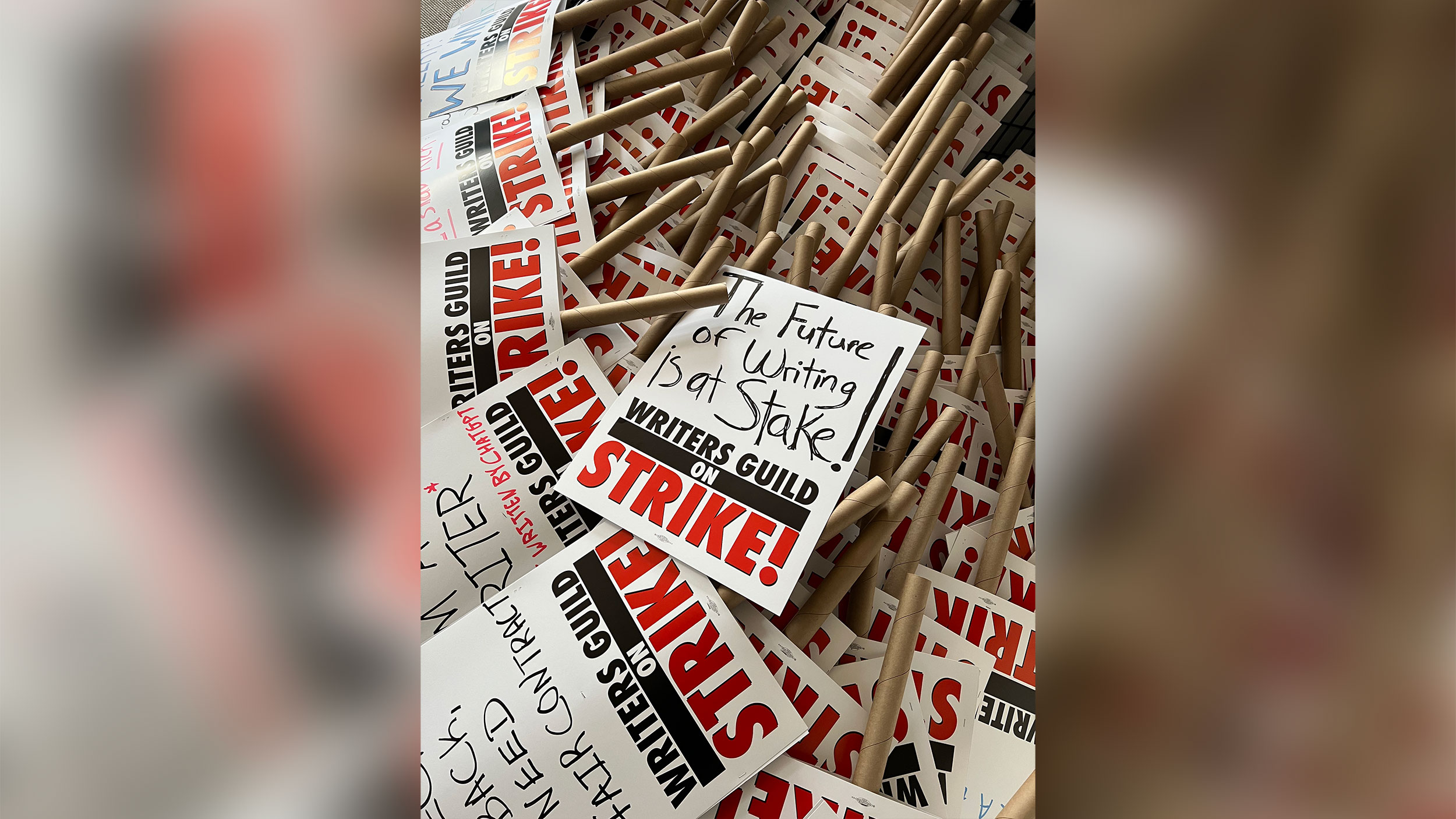 Film and TV writers go on strike, bringing production on many shows to a halt